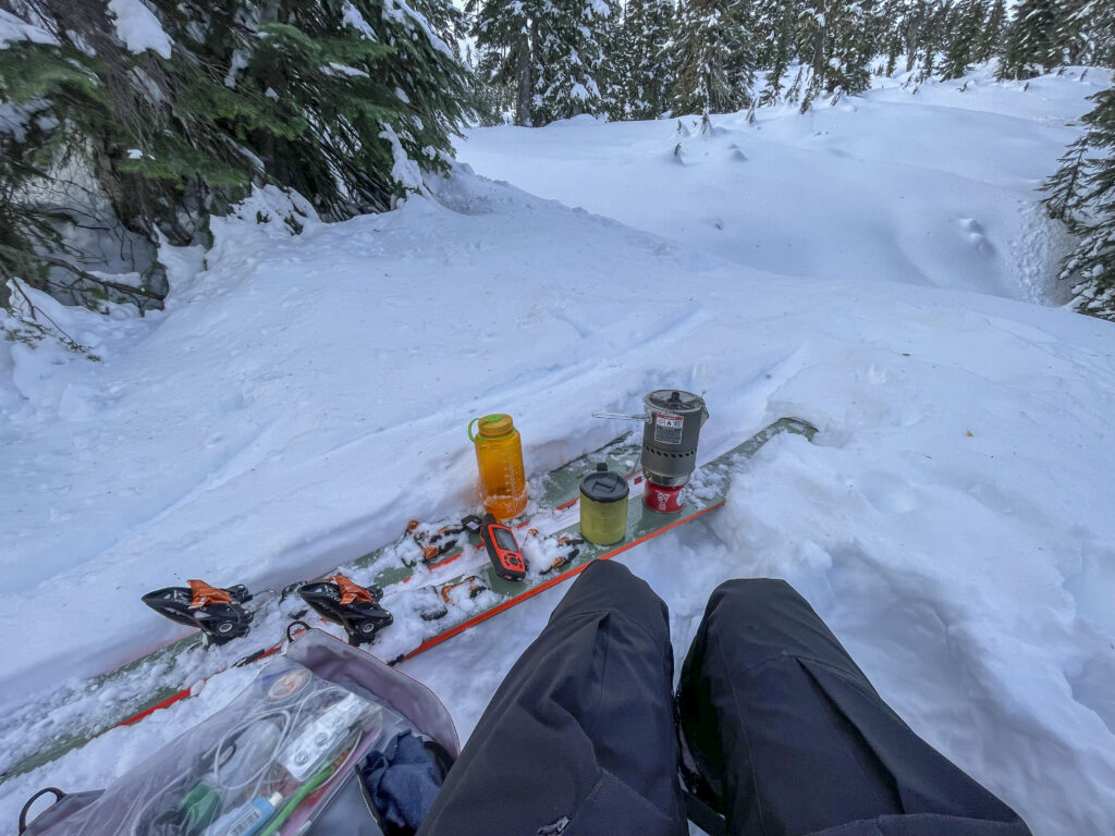 Break time coffee, water, and comms check. With the ski table and pack seat.